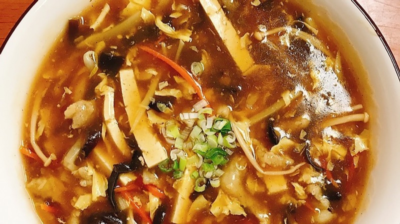 Hot and sour soup with tofu and mushrooms